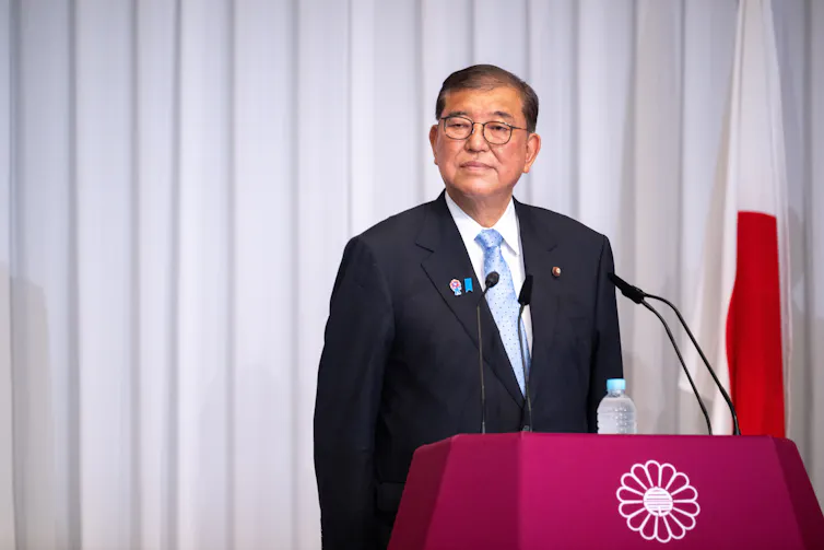 Shigeru Ishiba attends a press conference.