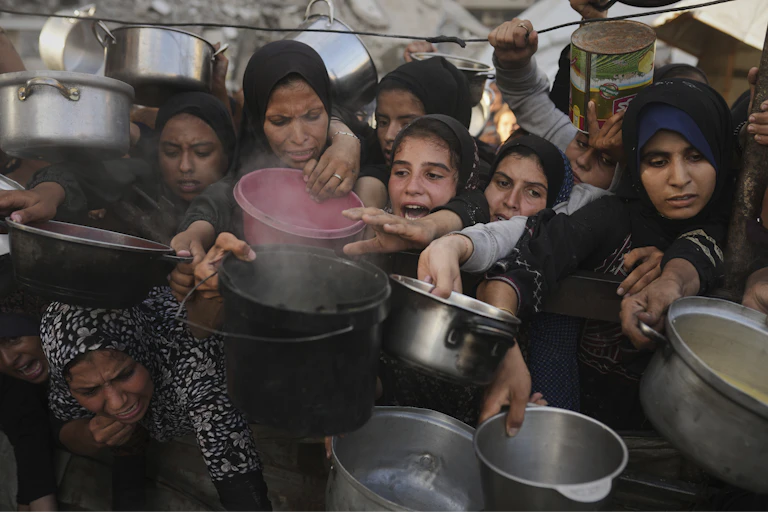 Starving Gazan children holding empty bowls, pleading for food