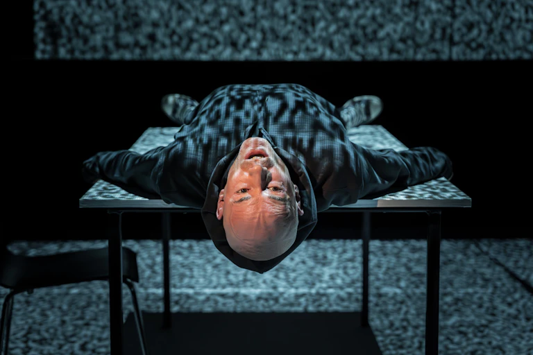 A man lying on a table