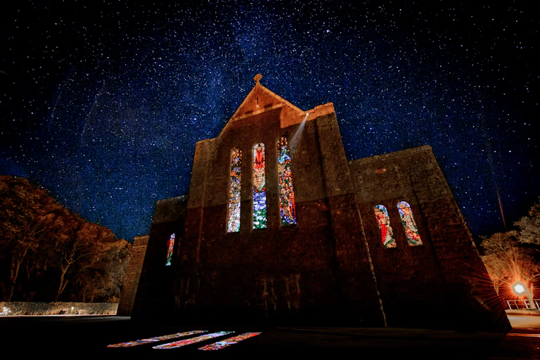 church with stained glass windows, dark night sky, Newport, Mayo Dark Sky Park