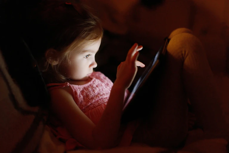 Little girl on tablet
