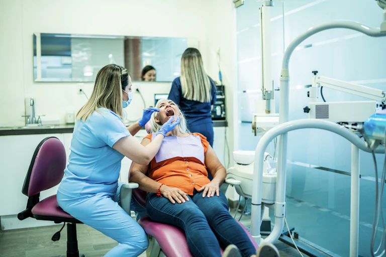 Woman has dental treatment