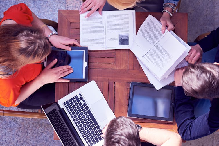 Overhead shot of students working on group project