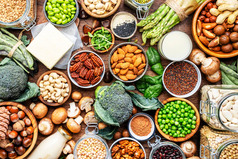 flatlay shot of veggie food in bowls on table