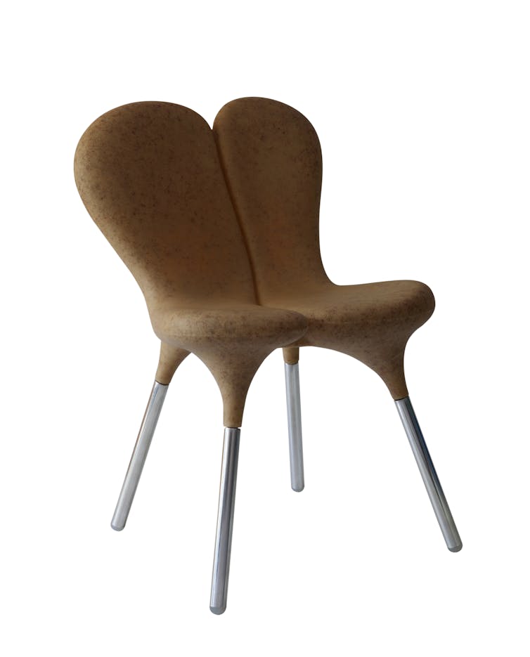 A brown chair with aluminum legs