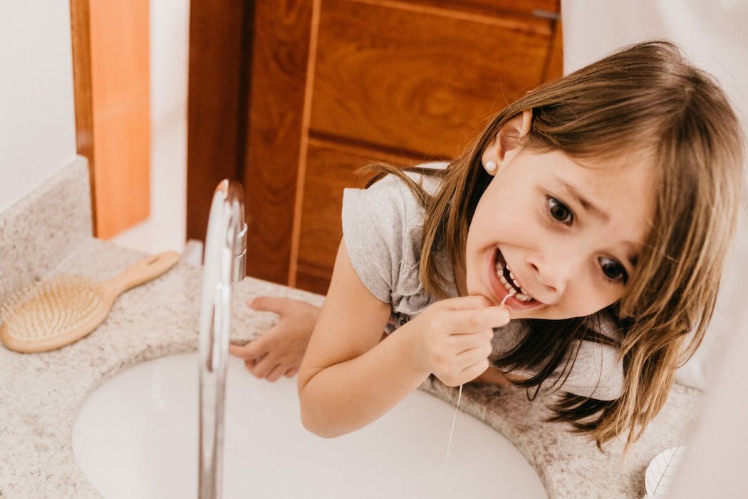 Kids need to floss too, even their baby teeth. But how do you actually get them to do it?
