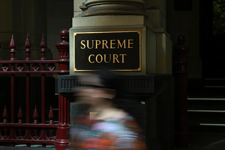 A sign says Supreme Court