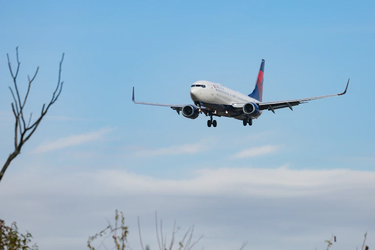 A Delta Air Lines plane is seen approaching John F. Kennedy International Airport in New York City.