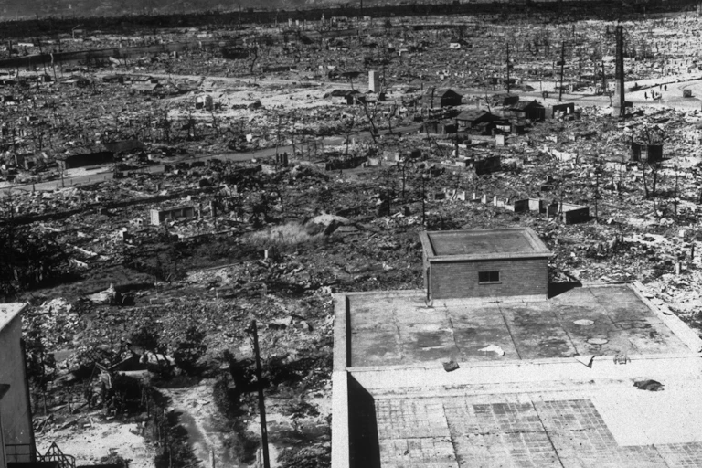 A view of a destroyed urban landscape, with very few buildings even having one or two walls standing.