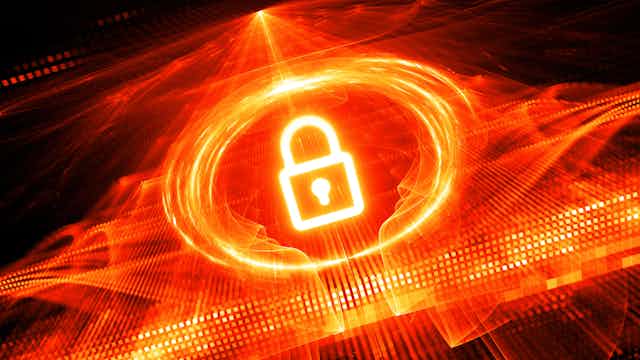 outline of a padlock in the center of a flame-like ring of light