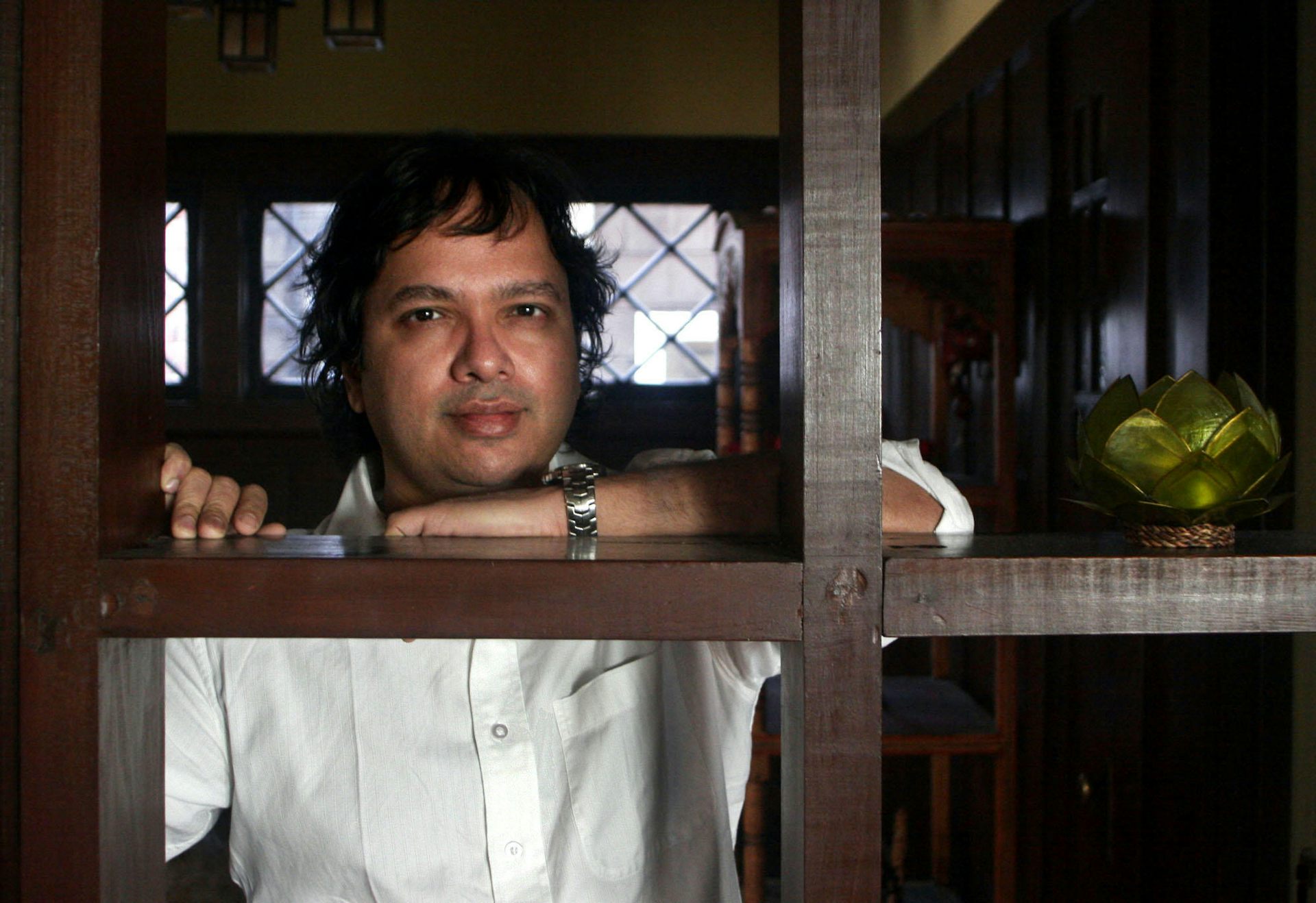 Vikram Chandra in a white shirt