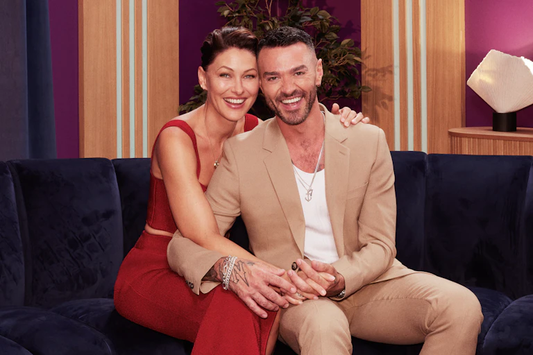 Emma and Matt Willis sat on a sofa