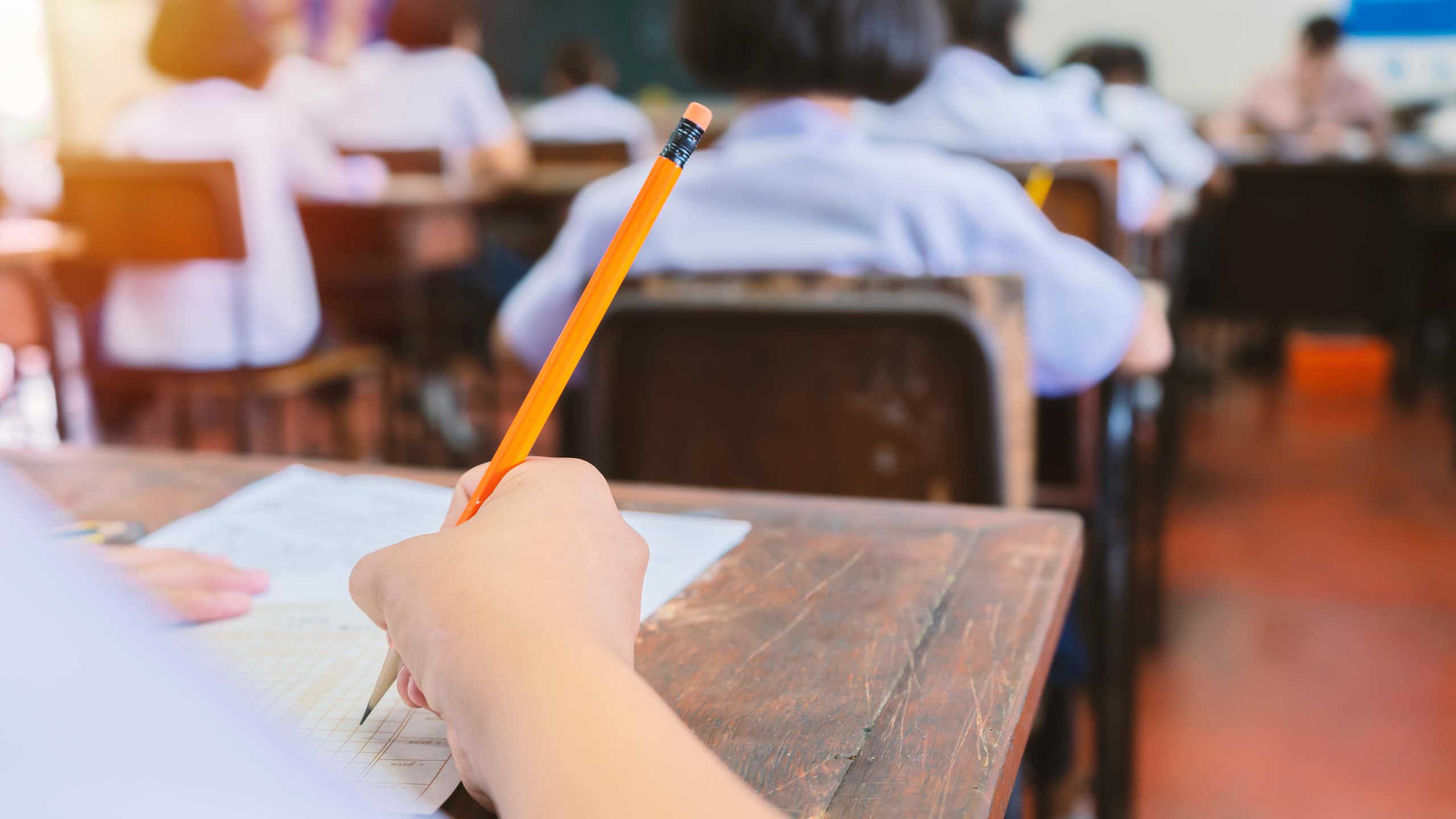 Close-up of student taking an exam.