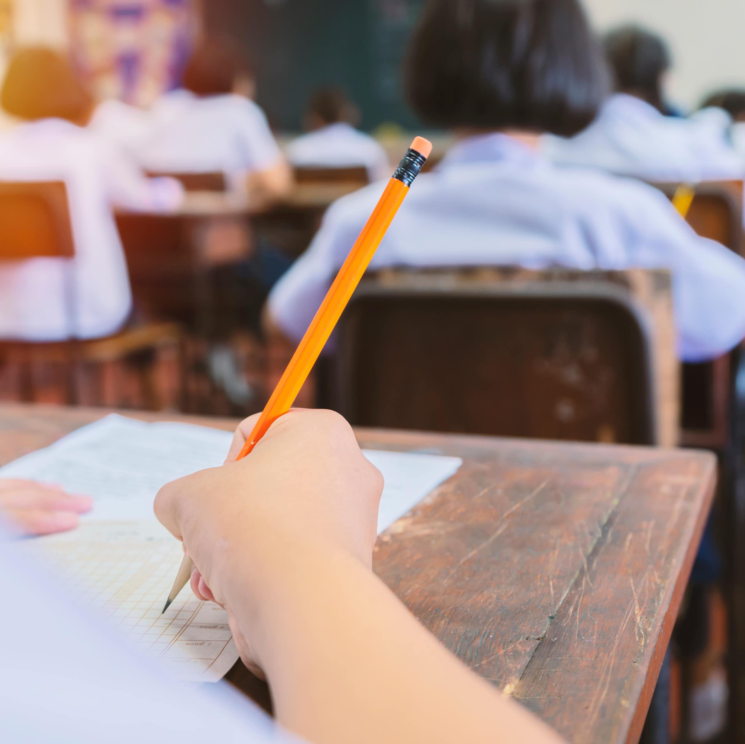 Close-up of student taking an exam.