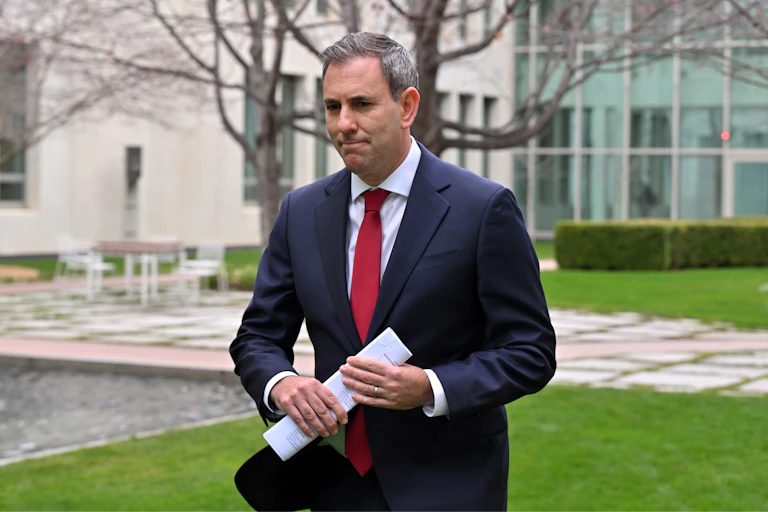 Treasurer Jim Chalmers arrives at a press conference at Parliament House in Canberra, Wednesday, July 30, 2025.