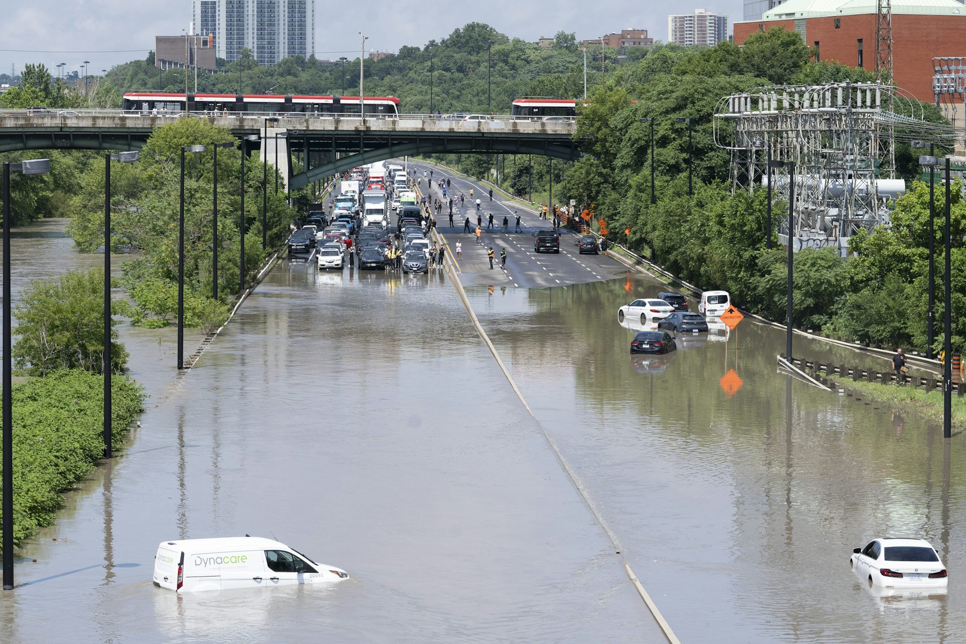 cars stranded on a flooded highway