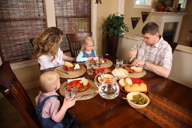 Family meals nourish your body, but that’s not all. Family image via www.shutterstock.com