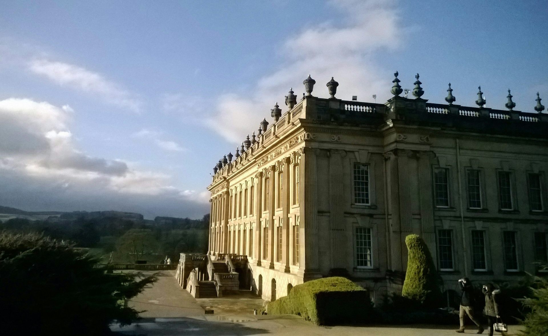 A large rectangular home against a blue sky.