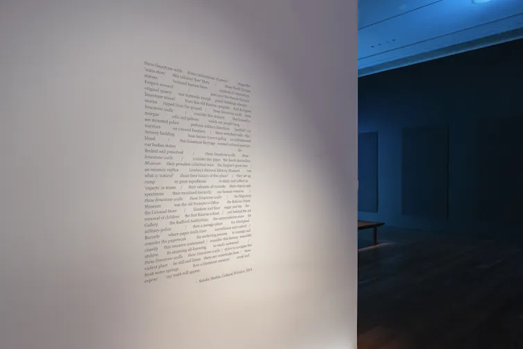 A poem on a gallery wall.