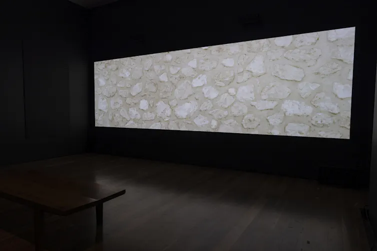 A video projection of rocks.
