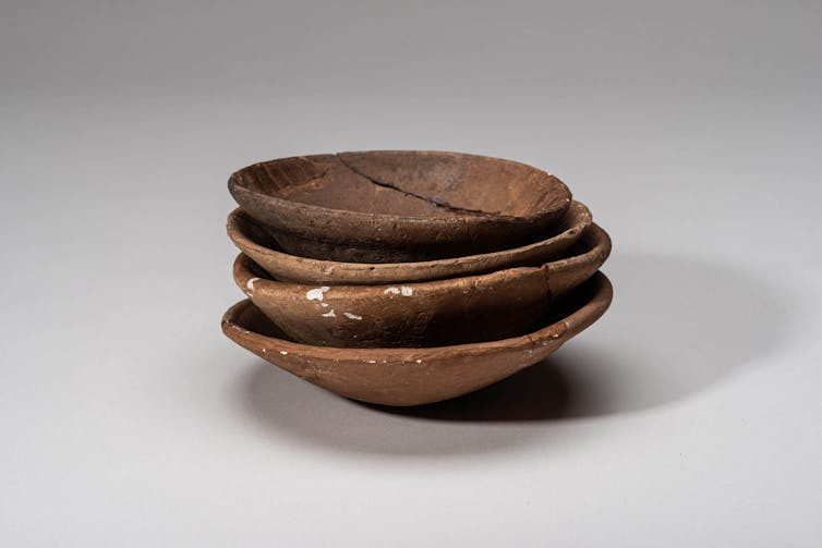 pile of brown plates