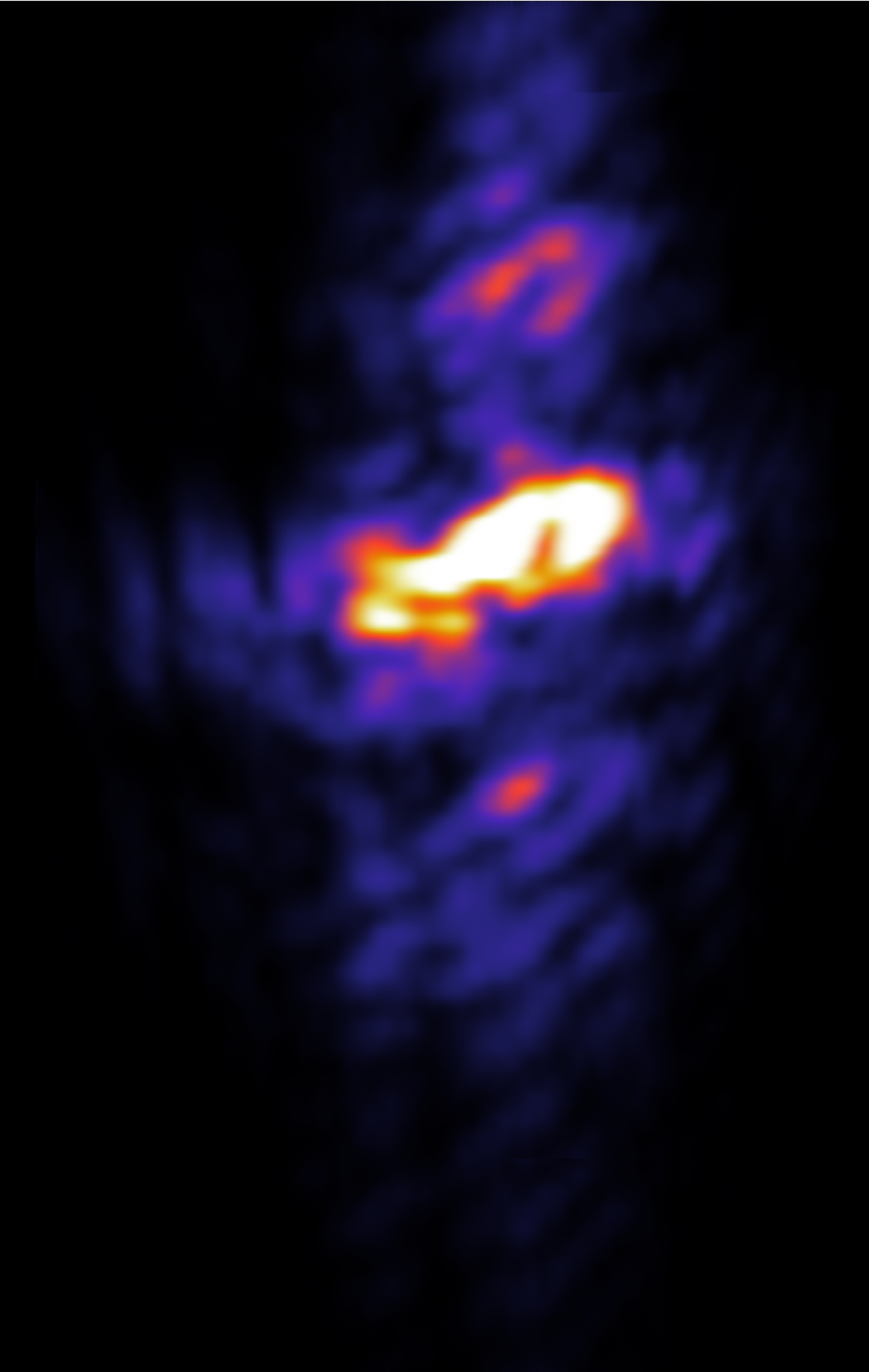 A figure showing several roughly spherical blobs of light, in a line with the largest and brightest in the center.