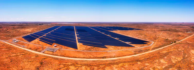 A solar farm in outback setting.