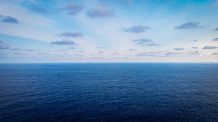 The Indian Ocean beneath a blue sky.
