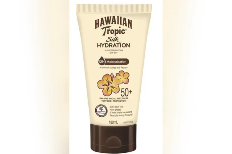 A bottle of Hawaiian Tropic sunscreen.