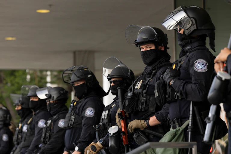 Masked police lined up