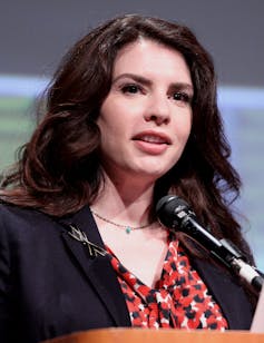 Twilight at 20: the numerous afterlives of Stephenie Meyer’s vampires 1 Stephenie Meyer at a microphone stand