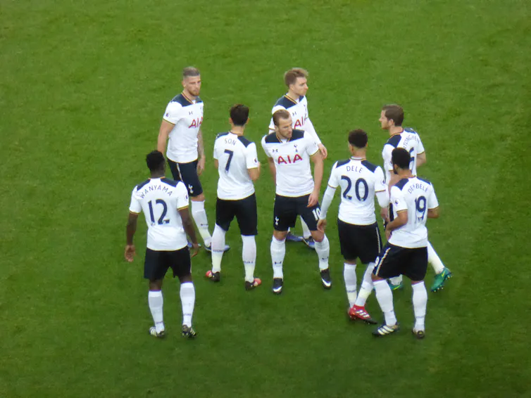 Tottenham Hotspurs players of the 2016–17 season wearing white.