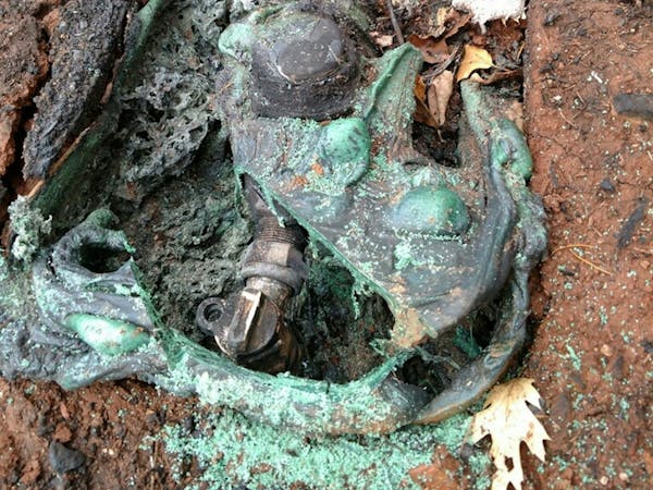 A fire melted the plastic cover of a water meter