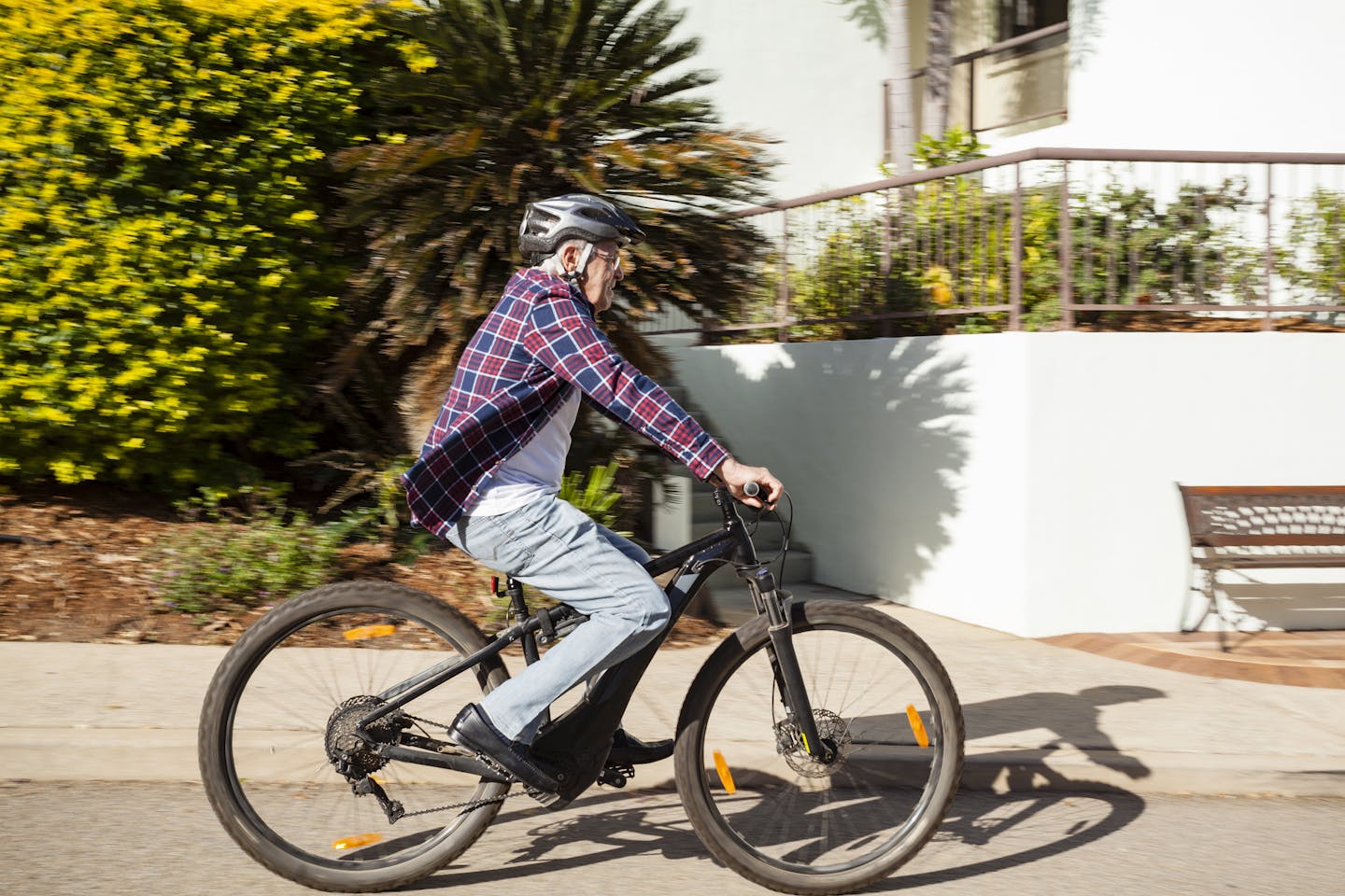 older man on e-bike