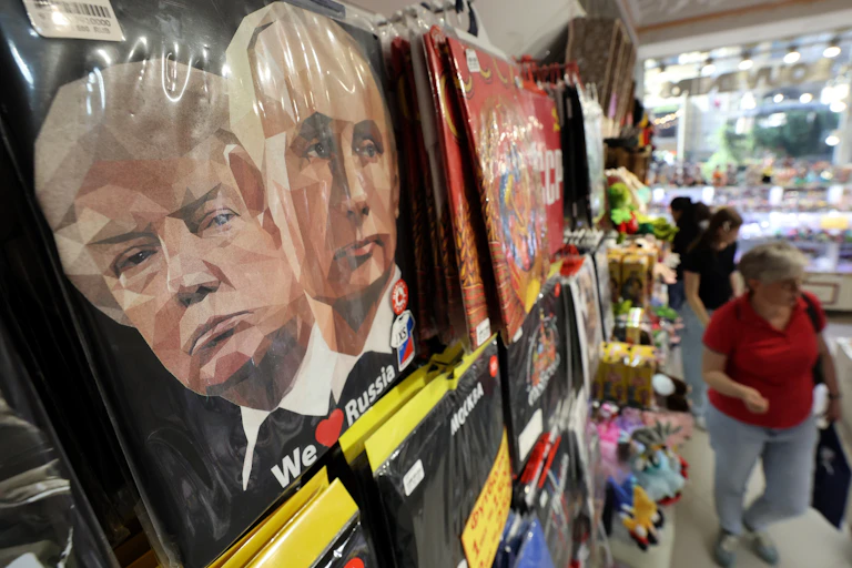 T-shirt with portraits of Vladimir Putin and Donald Trump at a market in Moscow, AUgust 2025.