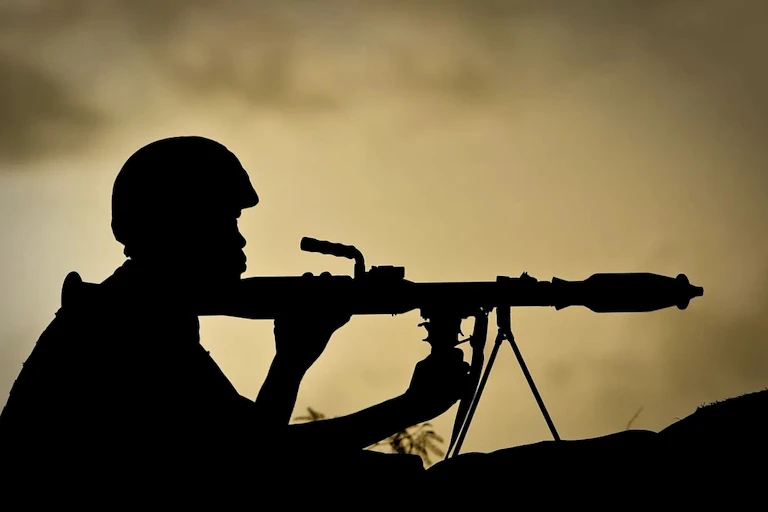 A man holding a gun