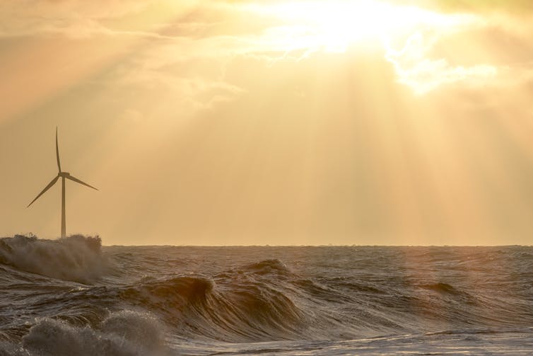 wind turbines in the sea off the coast of the UK