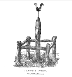 Illustration of a post surrounded by a crude wooden fence