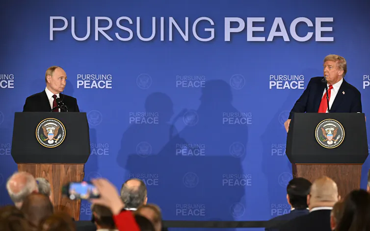 Donald Trump and Vladimir Putin delivering a statement to the media.