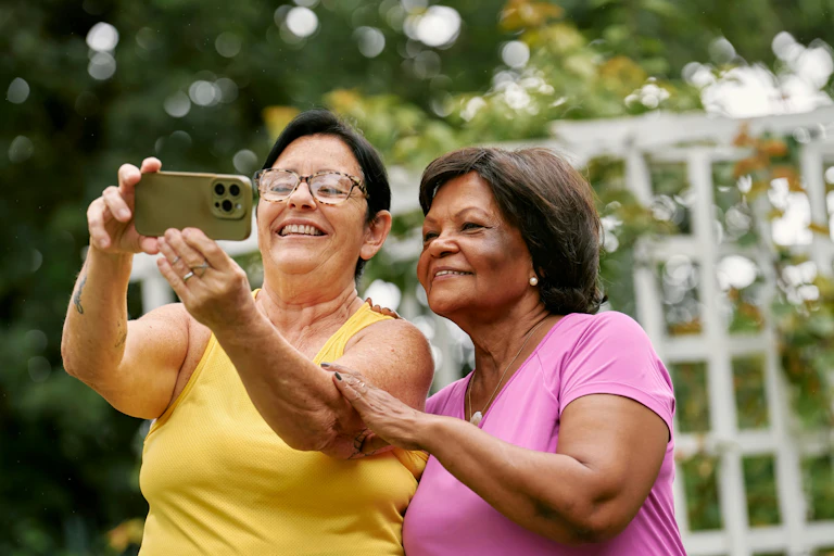 two mature women take a selfie