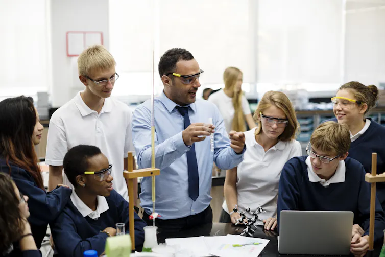 Group of students in science class