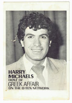 A headshot of a figure in a suit.