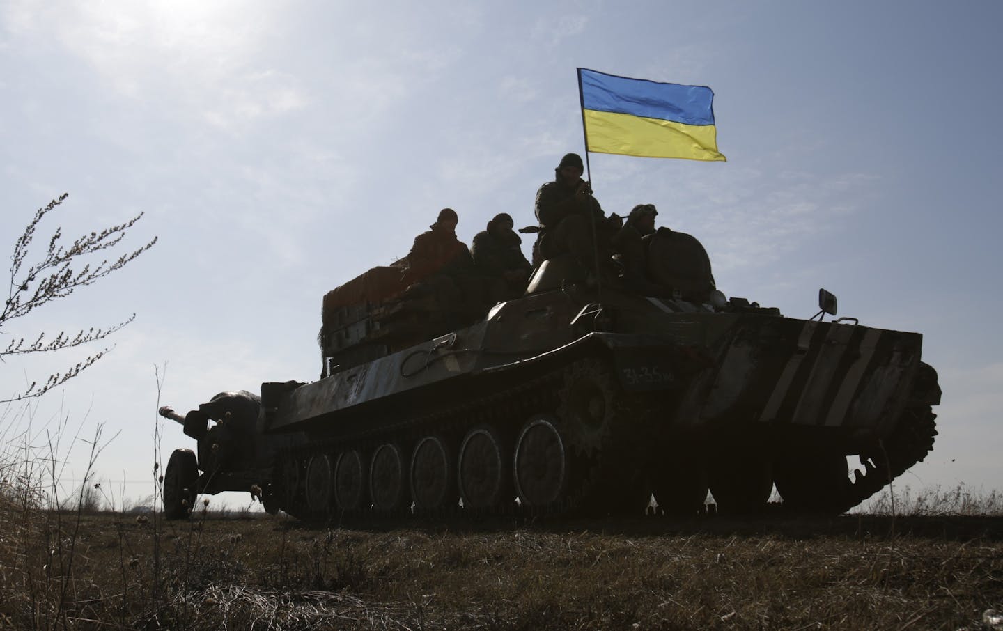 A tank with a flag on it.