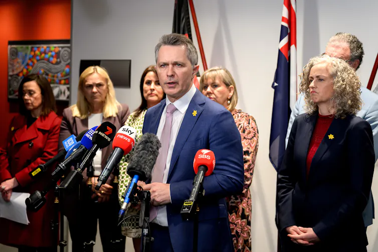 Federal Education Minister Jason Clare and federal Early Childhood Minister Jess Walsh at a press conference.