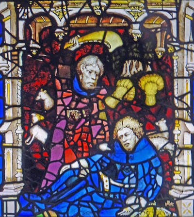 Stained glass showing Cain killing Abel
