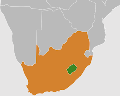 A map of the lower end of a continent showing a small green shape in the south surrounded by a large orange shape.