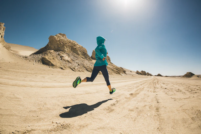 Person running a marathon in the desert.