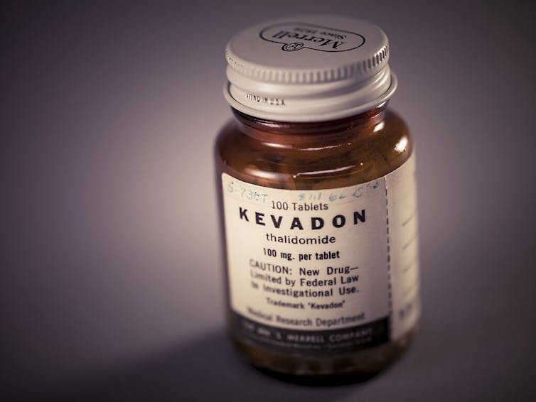 A pill bottle with a label carrying the drug's brand name, Kevadon, and its generic name, thalidomide.