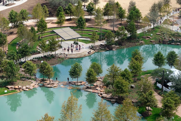 A bird’s eye view of the turquoise lakes and greenery at Aggie Park.