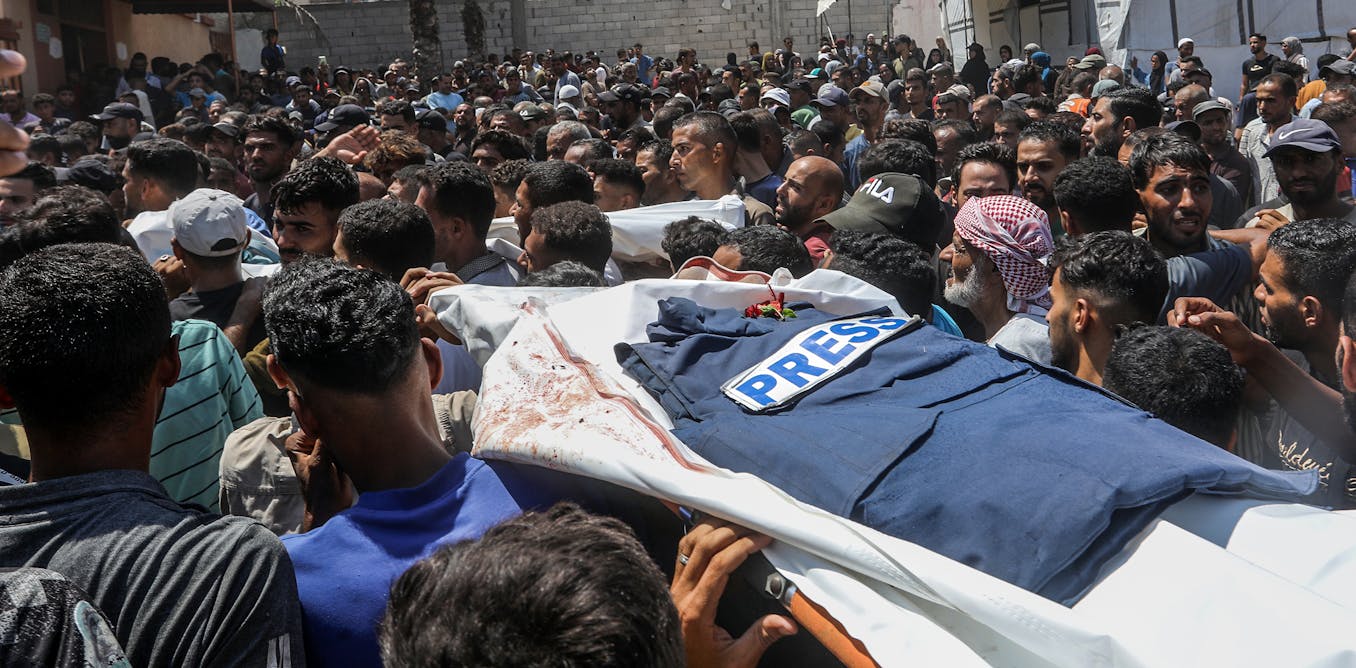 Israel-Palestinian Media: Decades of Targeting Journalists & Silencing Voices Israel-Palestinian Media: Decades of Targeting Journalists & Silencing Voices